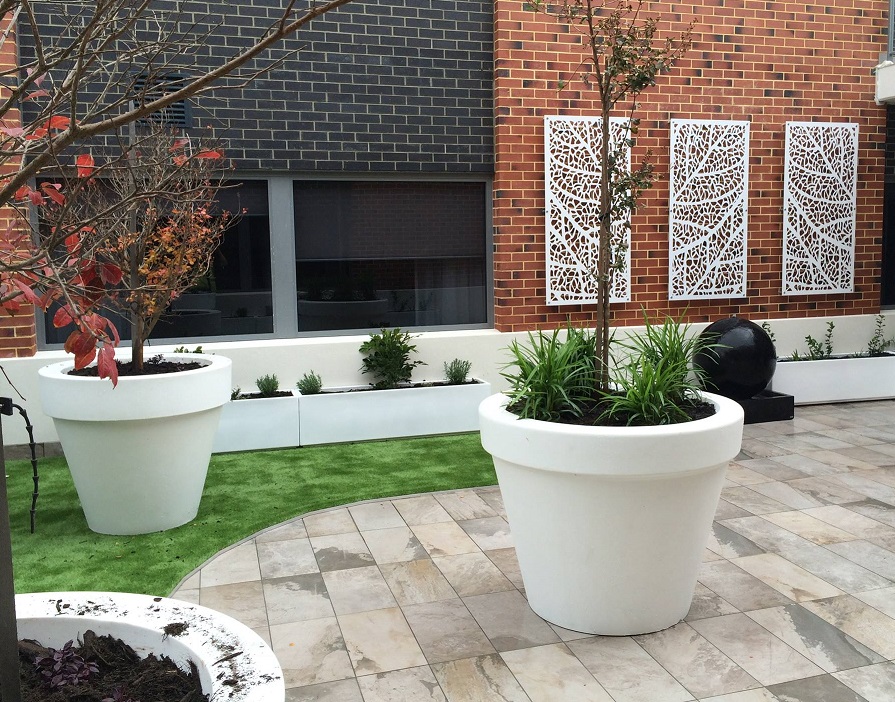 Landscaped Perth garden with paving and lawn by Exact Landscaping